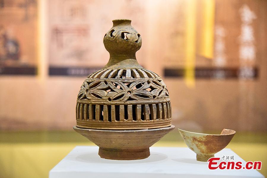 A museum of relics excavated from the Liujialing tomb in Guiyang County, Hunan Province opens to the public on Dec. 28, 2018. The tomb\'s tunnel and chamber were decorated with well-preserved, exquisite murals that reflected the life and burial customs long time ago. Findings in the tomb are of high historical and art values as they showed the migration of nobles from north to south after the Tang Dynasty (618-907). (Photo: China News Service/Ouyang Changhai)
