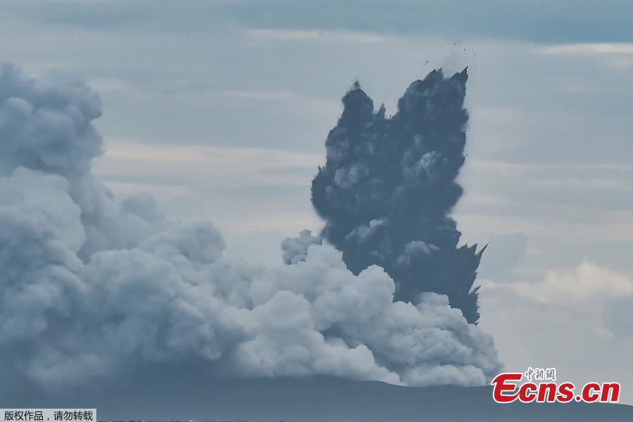 Mount Anak Krakatau volcano spews hot ash as seen from Sunda Strait, Lampung Province, Indonesia, Dec. 28, 2018. Indonesia on Thursday raised the alert level for the erupting Anak Krakatau volcano to the second-highest, and ordered all flights to steer clear, days after it triggered a tsunami that killed at least 430 people. (Photo/Agencies)