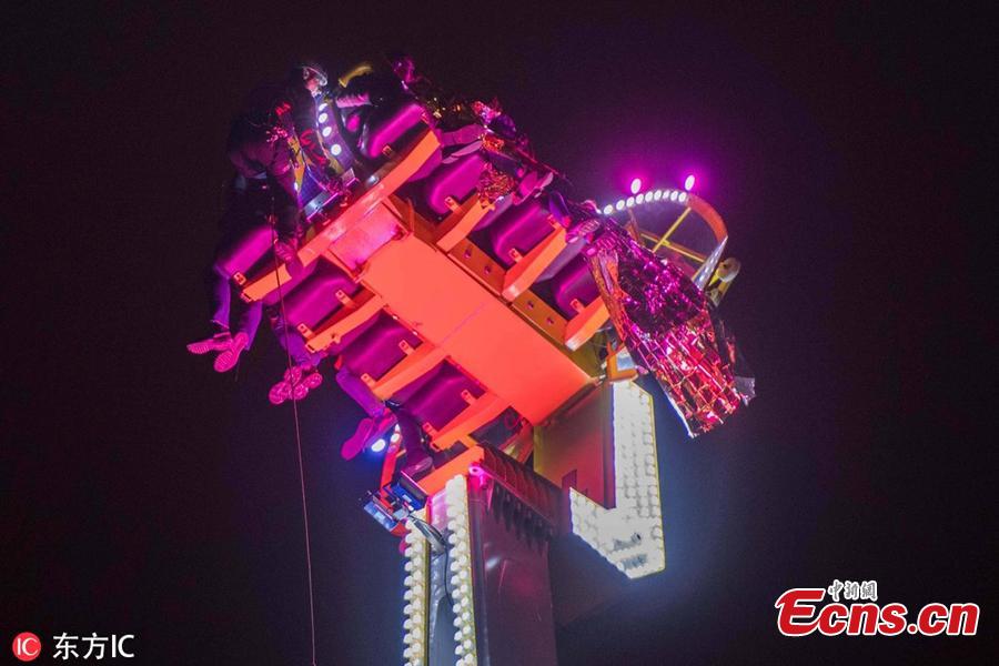 A fairground ride suspends in the air in Rennes, western France, Dec. 31, 2018. Three adults and five teenagers were trapped high in the air for more than eight hours from New Year’s Eve into the early hours of 2019. (Photo/IC)