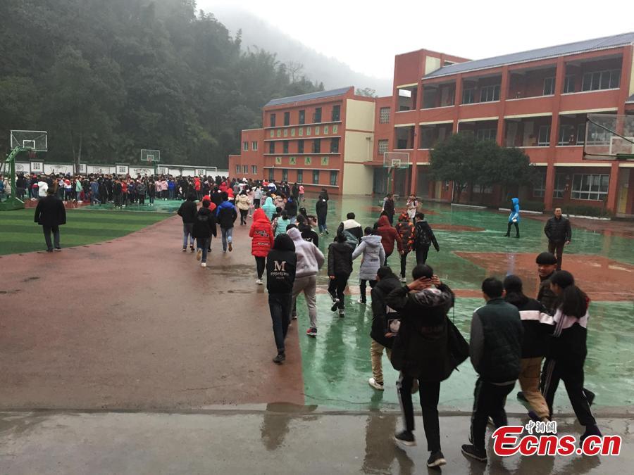 Students and teachers are evacuated to a safe area after a 5.3-magnitude earthquake jolted Gongxian County, Yibin City in Southwest China\'s Sichuan Province at 8:48 a.m., Jan. 3, 2019. No casualties have been reported but some houses were damaged, Xinhua reported.  (Photo: China News Service/Chang Ting)