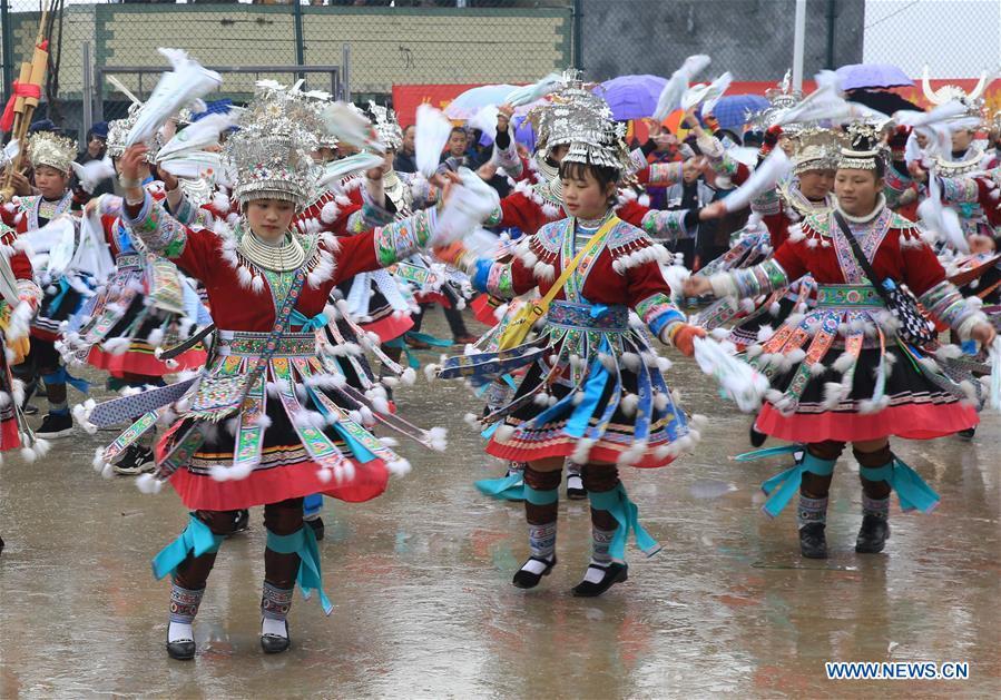 Girls of Miao ethnic group dance in Rongshui, Liuzhou City of south China\'s Guangxi Zhuang Autonomous Region, Jan. 5, 2019. Local Miao people celebrated their traditional New Year in various ways. (Xinhua/Long Tao)