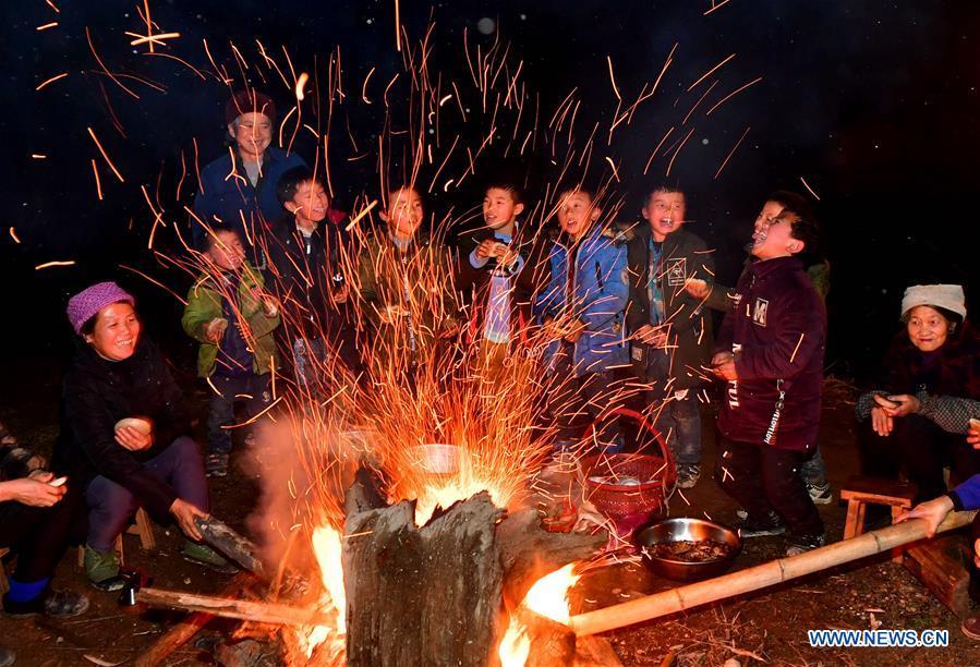 Villagers get together outdoor in Rongshui, Liuzhou City of south China\'s Guangxi Zhuang Autonomous Region, Jan. 5, 2019. Local Miao people celebrated their traditional New Year in various ways. (Xinhua/Huang Xiaobang)