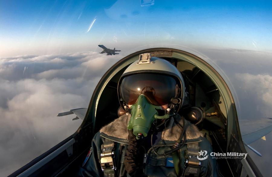J-11B fighter jets attached to an aviation brigade of the air force with the PLA Northern Theater Command fly in formation during a round-the-clock flight training exercise on January 3, 2019. (Photo/eng.chinamil.com.cn)