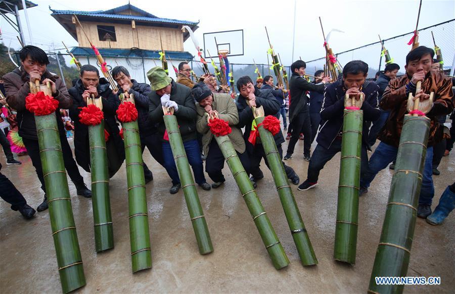 People of Miao ethnic group play Lusheng in Rongshui, Liuzhou City of south China\'s Guangxi Zhuang Autonomous Region, Jan. 5, 2019. Local Miao people celebrated their traditional New Year in various ways. (Xinhua/Long Linzhi)
