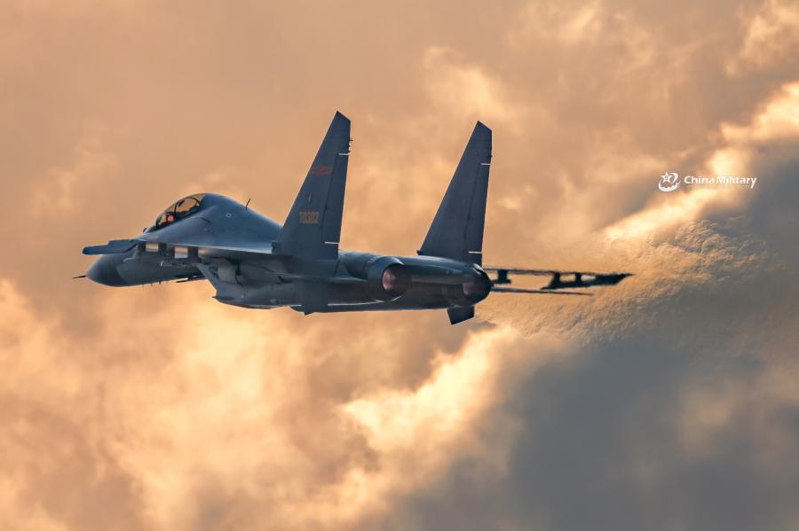 A J-11B fighter jet attached to an aviation brigade of the air force with the PLA Northern Theater Command flies in the sky during a round-the-clock flight training exercise on January 3, 2019.  (Photo/eng.chinamil.com.cn)