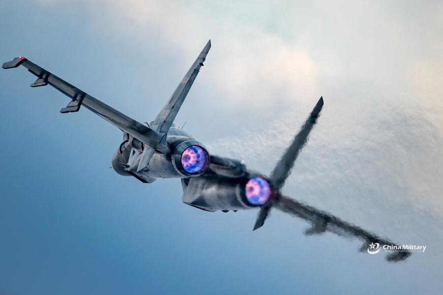 A J-11B fighter jet attached to an aviation brigade of the air force with the PLA Northern Theater Command flies in the sky during a round-the-clock flight training exercise on January 3, 2019.  (Photo/eng.chinamil.com.cn)