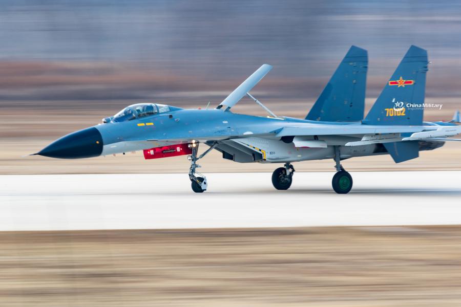 A J-11B fighter jet attached to an aviation brigade of the air force with the PLA Northern Theater Command taxis on the runway after landing during a round-the-clock flight training exercise on January 3, 2019. (Photo/eng.chinamil.com.cn)