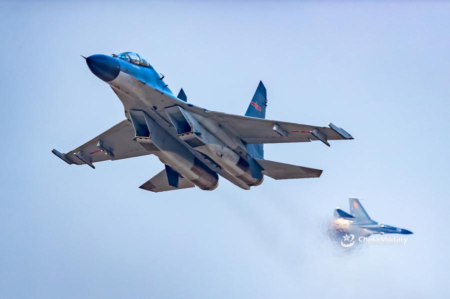 A J-11B fighter jet attached to an aviation brigade of the air force with the PLA Northern Theater Command flies in the sky during a round-the-clock flight training exercise on January 3, 2019.  (Photo/eng.chinamil.com.cn)