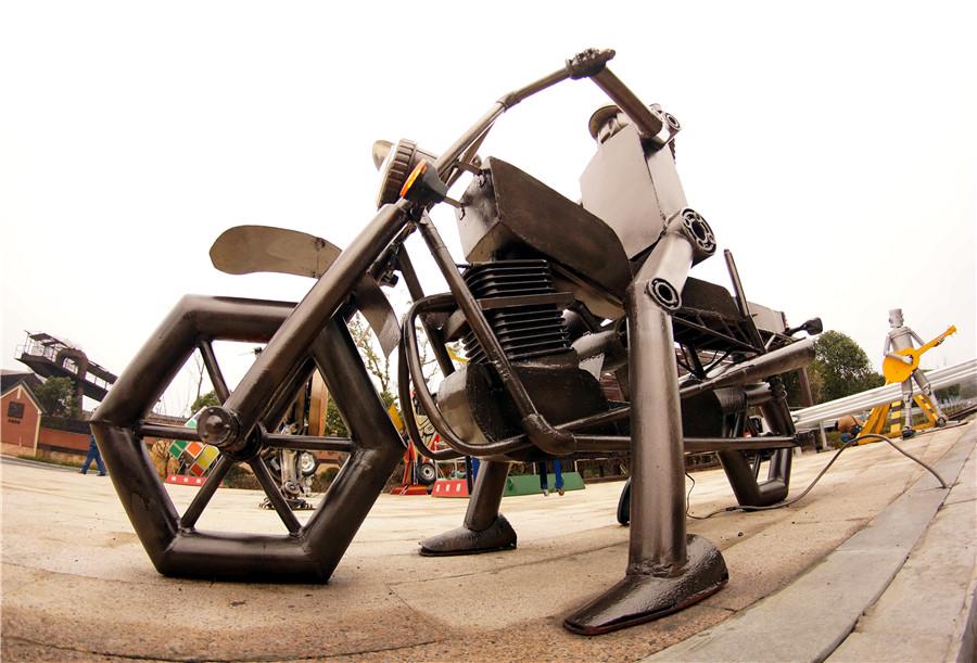 A sculpture of a rider on a motorcycle is on display at an iron and steel factory in Nanchang, Jiangxi Province, Jan. 6, 2019. (Photo/chinadaily.com.cn)