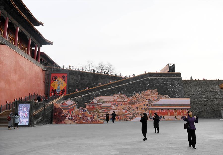 Visitors tour the Palace Museum, also known as the Forbidden City in Beijing, capital of China, Jan. 7, 2019. In celebrating of the most magnificent of all traditional holidays, the Palace Museum presents exhibition of \