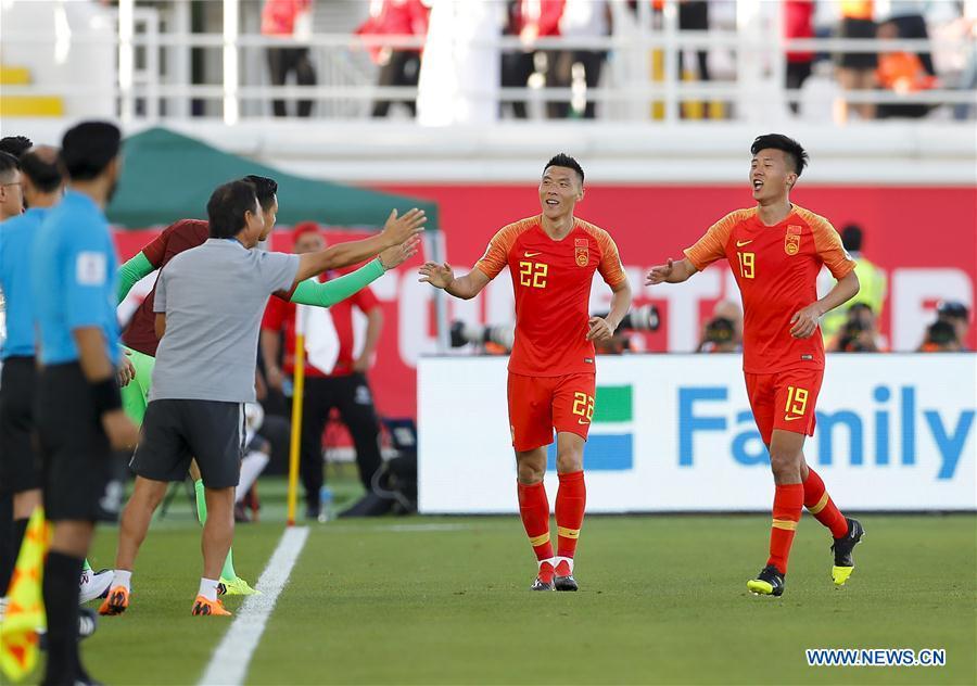 Yu Dabao (2nd R) of China celebrates scoring during the group C match between China and Kyrgyz Republic of the AFC Asian Cup UAE 2019 in Al Ain, the United Arab Emirates (UAE), on Jan. 7, 2019. China won 2-1. (Xinhua/Ding Xu)