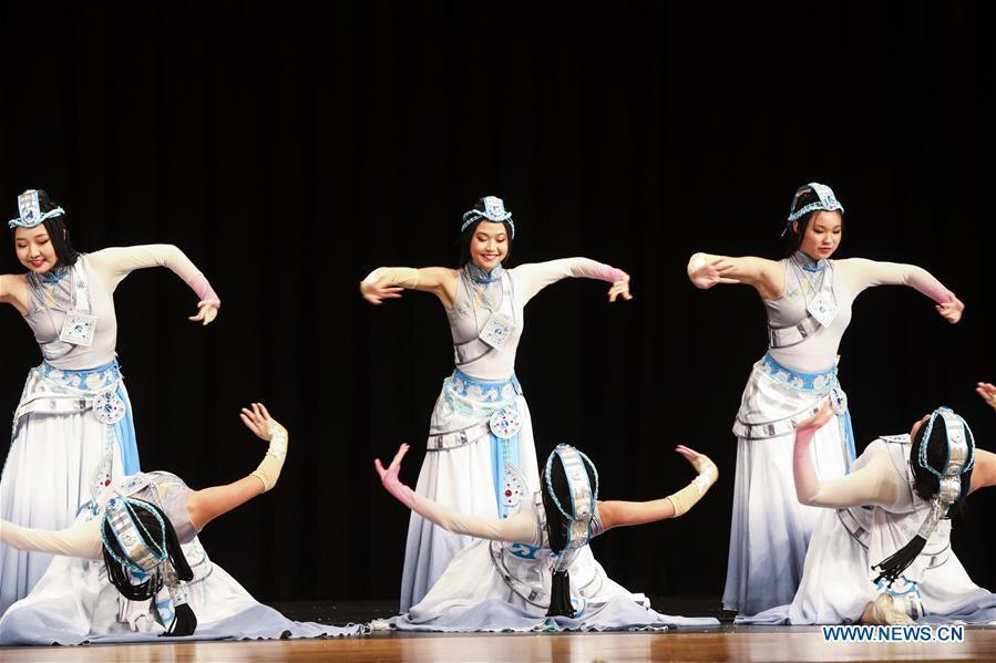 Students from the Great Wall Chinese School perform a Chinese folk dance during a New Year celebration organized by Greater Philadelphia Chinese School of Union (GPCSU) in Philadelphia, the United States, on Jan. 6, 2019. More than 100 young Chinese Americans have charmed fans of traditional Chinese folk dances and costumes in a grand New Year celebration performance. (Xinhua/Wang Ying)