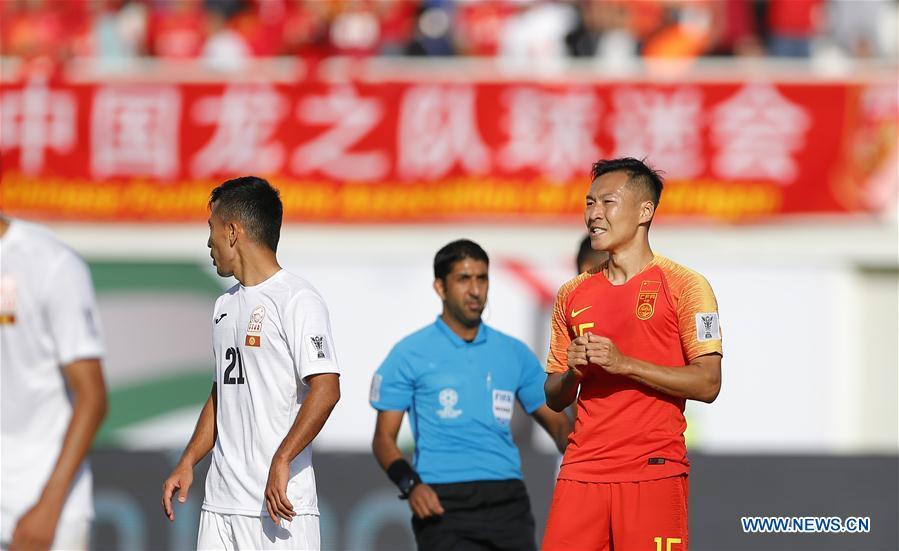 Wu Xi (1st R) of China reacts during the group C match between China and Kyrgyz Republic of the AFC Asian Cup UAE 2019 in Al Ain, the United Arab Emirates (UAE), on Jan. 7, 2019. China won 2-1. (Xinhua/Ding Xu)