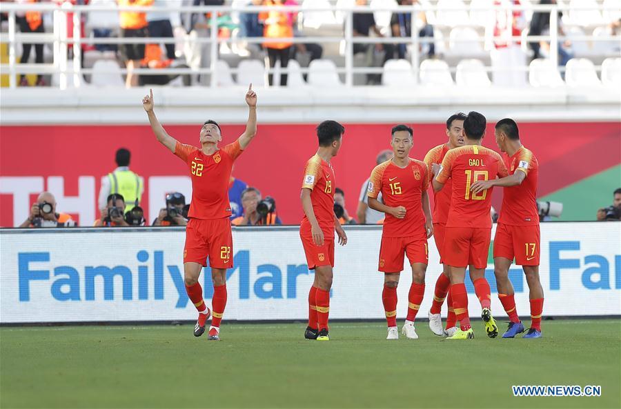 Yu Dabao (1st L) of China celebrates scoring during the group C match between China and Kyrgyz Republic of the AFC Asian Cup UAE 2019 in Al Ain, the United Arab Emirates (UAE), on Jan. 7, 2019. China won 2-1. (Xinhua/Ding Xu)