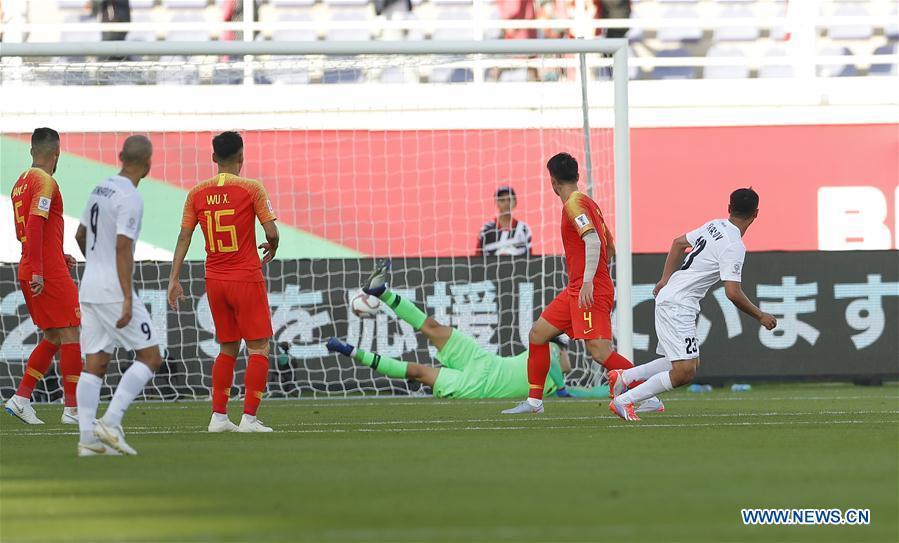 Akhlidin Israilov (1st R) of Kyrgyz Republic scores during the group C match between China and Kyrgyz Republic of the AFC Asian Cup UAE 2019 in Al Ain, the United Arab Emirates (UAE), on Jan. 7, 2019. China won 2-1. (Xinhua/Ding Xu)