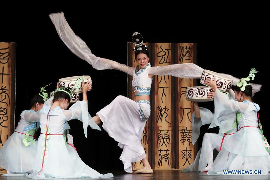 Students from the Guanghua Chinese School perform a classic Chinese dance during a New Year celebration organized by Greater Philadelphia Chinese School of Union (GPCSU) in Philadelphia, the United States, on Jan. 6, 2019. More than 100 young Chinese Americans have charmed fans of traditional Chinese folk dances and costumes in a grand New Year celebration performance. (Xinhua/Wang Ying)