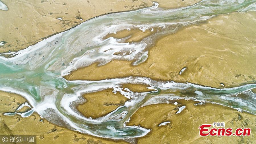 An aerial view of the frozen branches of the Yellow River in Yuncheng City, North China\'s Shanxi Province. (Photo/VCG)