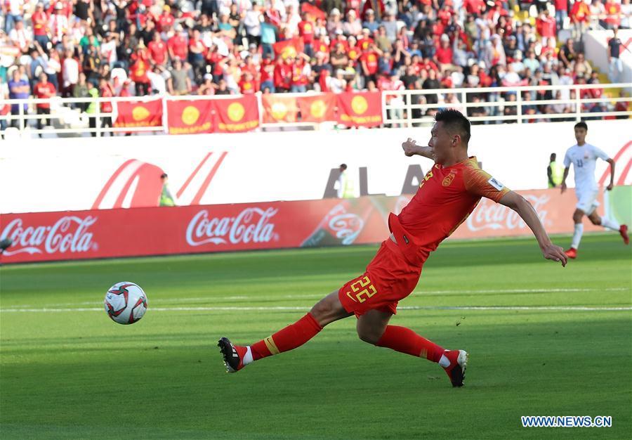 Yu Dabao (front) of China scores during the group C match between China and Kyrgyz Republic of the AFC Asian Cup UAE 2019 in Al Ain, the United Arab Emirates (UAE), on Jan. 7, 2019. (Xinhua/Cao Can)