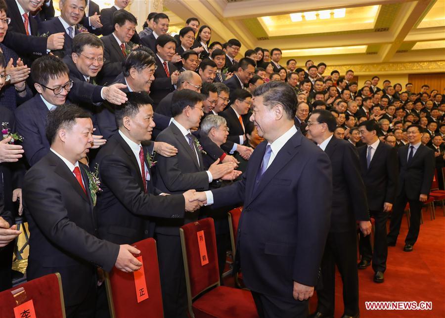 Chinese President Xi Jinping, also general secretary of the Communist Party of China (CPC) Central Committee and chairman of the Central Military Commission, and other leaders, including Li Keqiang, Wang Huning, and Han Zheng, all members of the Standing Committee of the Political Bureau of the CPC Central Committee, meet with representatives of the winners before an annual ceremony to honor distinguished scientists, engineers, and research achievements at the Great Hall of the People in Beijing, capital of China, Jan. 8, 2019. (Xinhua/Ju Peng)