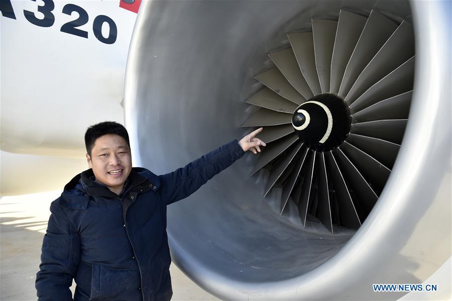 Zhu Yue explains the design of his \