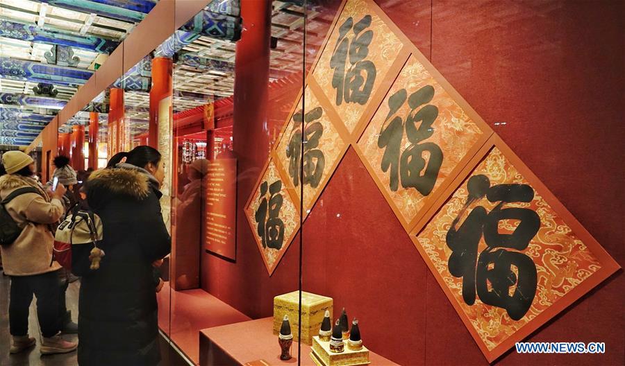People visit an exhibition at the Palace Museum, also known as the Forbidden City, in Beijing, capital of China, Jan. 8, 2019. The Palace Museum presents exhibition of \