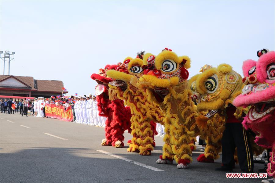 People perform lion dance to welcome the 30th fleet of Chinese navy escort at Sihanoukville Autonomous Port, Cambodia, Jan. 9, 2019. The 30th Chinese naval escorting fleet, composed of missile frigates \