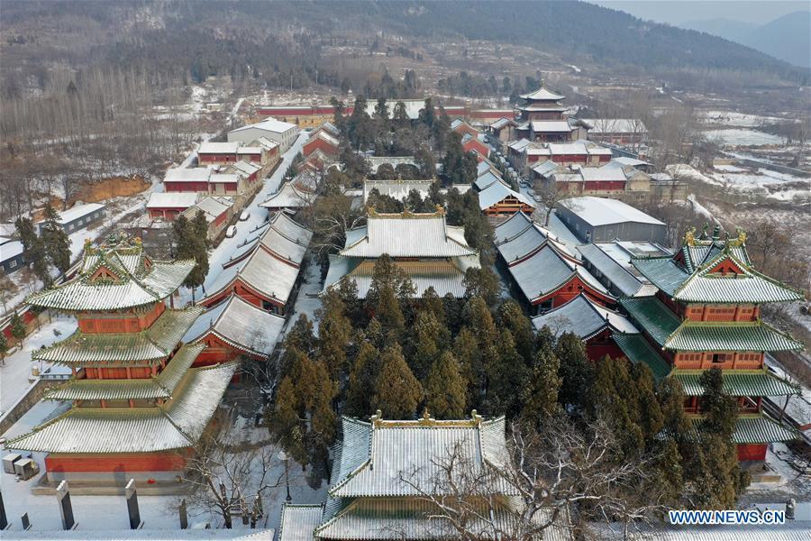 Aerial photo taken on Jan. 10, 2019 shows the snow-covered Shaolin Temple in Dengfeng City, central China\'s Henan Province. (Xinhua/Feng Dapeng)