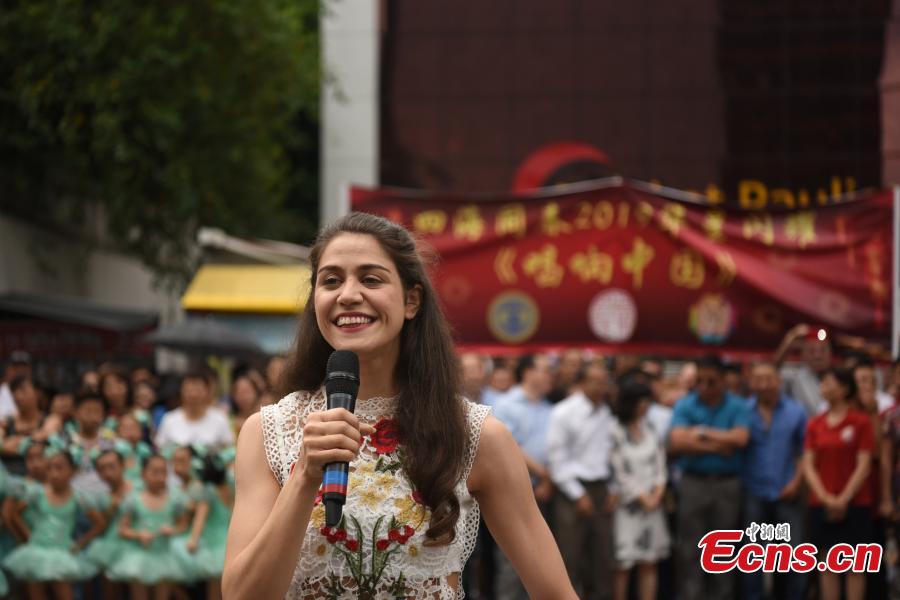 A performance to celebrate the upcoming Spring Festival, China\'s Lunar New Year, on Paulista Avenue, one of the most important avenues in Sao Paulo, Brazil, Jan. 13, 2019. Thousands of people watched the show organized by several local Chinese organizations. (Photo: China News Service/Mo Chengxiong)