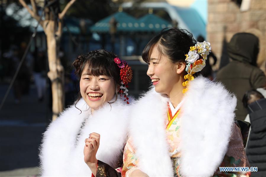 Japanese girls in kimonos celebrate Coming of Age together at Tokyo Disneyland in Chiba, Japan, Jan. 14, 2019. People who turned 20-year-old took part in the annual Coming of Age Day ceremony in Japan on Monday. (Xinhua/Du Xiaoyi)
