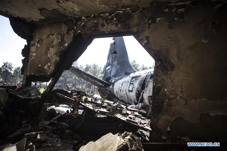 Rescuers work at the site of a Boeing 707 plane crash in Karaj, Iran, Jan. 14, 2019. At least 15 people were killed on Monday in the crash. (Xinhua/Ahmad Halabisaz)