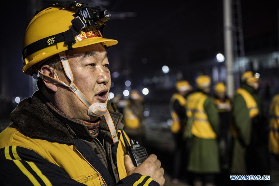 A worker conducts on the construction site of Xi\'an Railway Station in Xi\'an, capital of northwest China\'s Shaanxi Province, Jan. 15, 2019. After six hours of continuous overnight work of 1,000 plus workers, the reconstruction and extension project of the Xi\'an Railway Station entered the phase of main project construction on Tuesday, which laid a solid foundation for the upcoming Spring Festival travel rush.(Xinhua/Tao Ming)