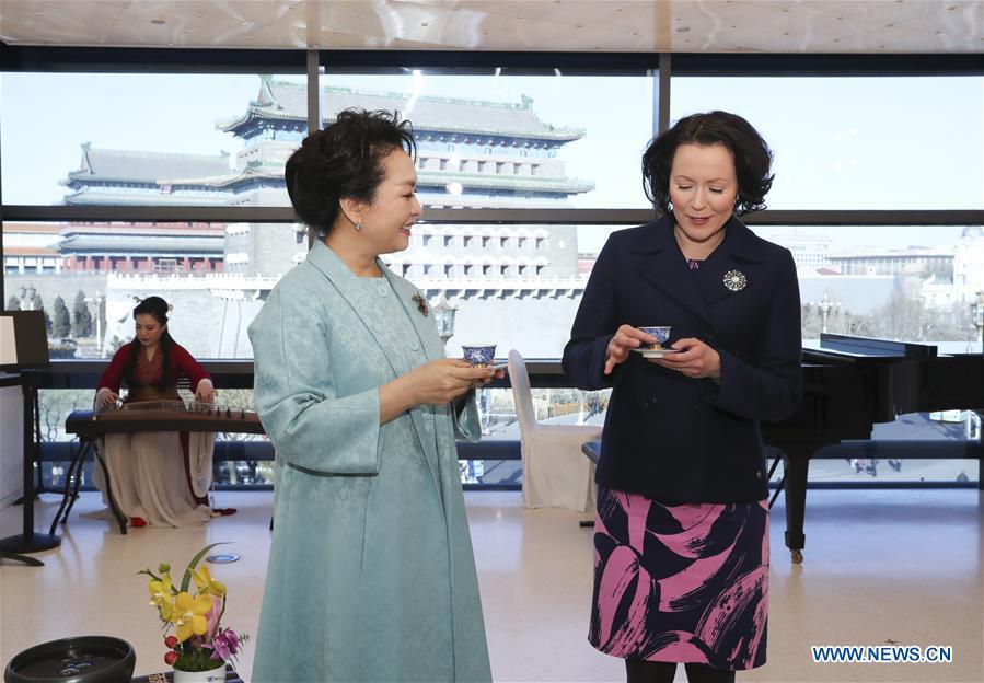 Peng Liyuan (L, front), the wife of Chinese President Xi Jinping, attends a show including poetry reading and musical performances with Jenni Haukio, wife of Finnish President Sauli Niinisto, in Beijing, capital of China, Jan. 15, 2019. (Xinhua/Ding Lin)