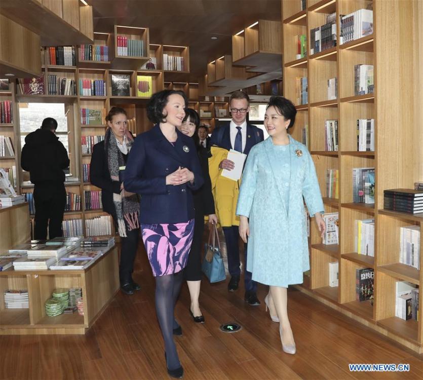 Peng Liyuan (R, front), the wife of Chinese President Xi Jinping, attends a show including poetry reading and musical performances with Jenni Haukio, wife of Finnish President Sauli Niinisto, in Beijing, capital of China, Jan. 15, 2019. (Xinhua/Ding Lin)