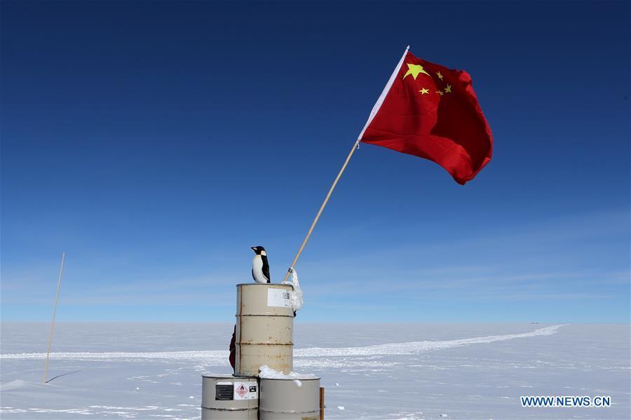 The Chinese national flag is seen at the area of the Dome Argus (Dome A), the peak of Antarctica\'s inland icecap, in Antarctica, Jan. 16, 2019. (Xinhua/Liu Shiping)