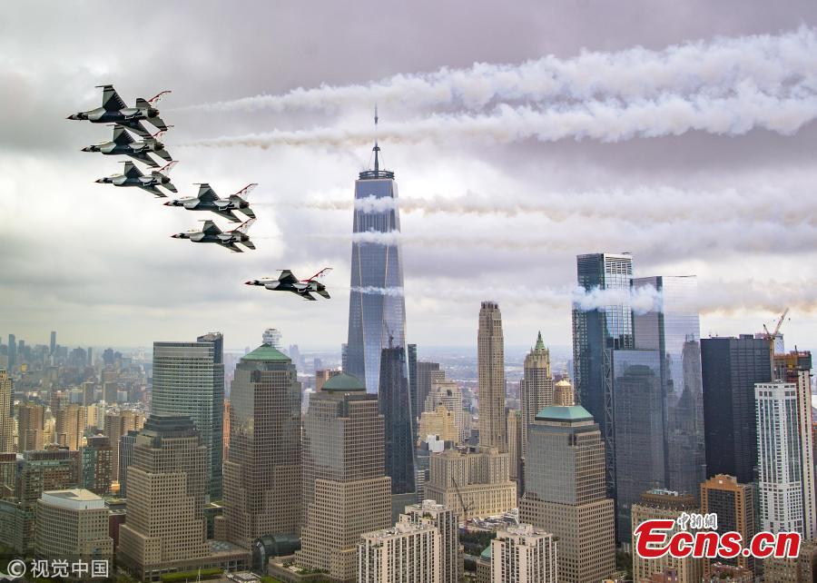 The Thunderbirds Delta formation performs a Pass in Review while flying past the Freedom Tower in New York, Sept. 17, 2018. (Photo/VCG)