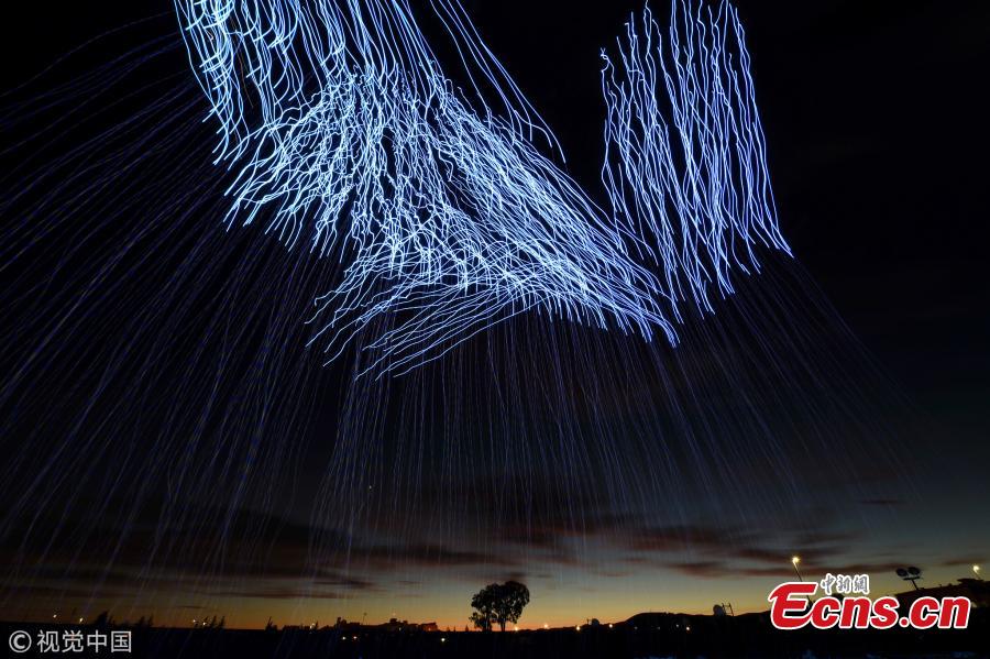 A view of Travis Air Force Base, Calif.\'s Intel Shooting Star Drone light show where Travis families were shown the choreographed capabilities of over 500 drones during an Independence Day celebration July 5, 2018. The drones conducted a show consisting of various designs meant to highlight both the U.S. Air Force\'s and Travis\' history. (Photo/VCG)