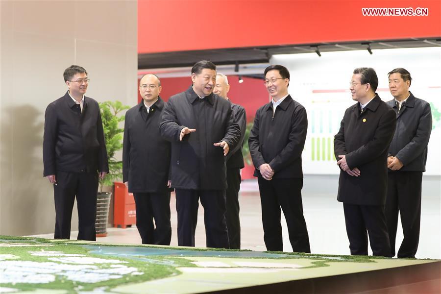 Chinese President Xi Jinping listens to the introduction of the general plan, policy system and construction of the Xiongan New Area at the Xiongan citizen service center during his inspection in the Xiongan New Area, north China\'s Hebei Province, Jan. 16, 2019. (Xinhua/Ju Peng)