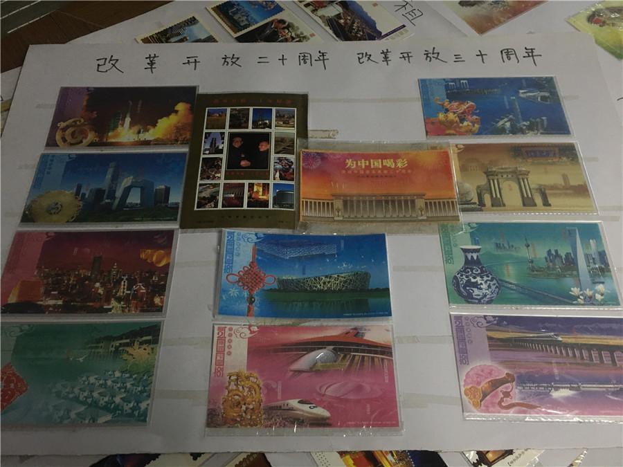 Part of Kong Xiangming\'s postcard collection, featuring the 60th anniversary of the founding of the People\'s Republic of China.  (Photo/chinadaily.com.cn)