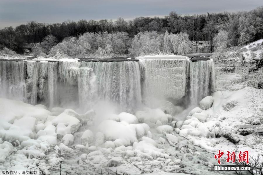 Water flows around ice, formed on the American Falls in Niagara Falls, New York, due to subzero temperatures, viewed from the Canadian side, in Niagara Falls, Ontario, Canada, Jan. 22, 2019. (Photo/Agencies)