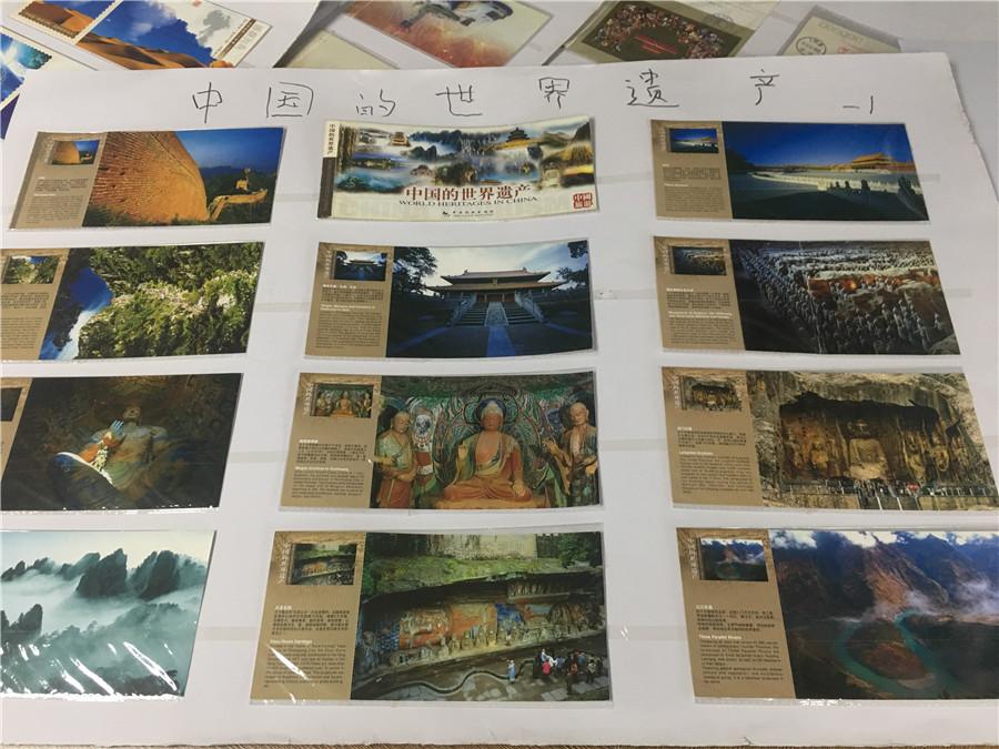 Part of Kong Xiangming\'s postcard collection, featuring world heritage sites in China. (Photo/chinadaily.com.cn)