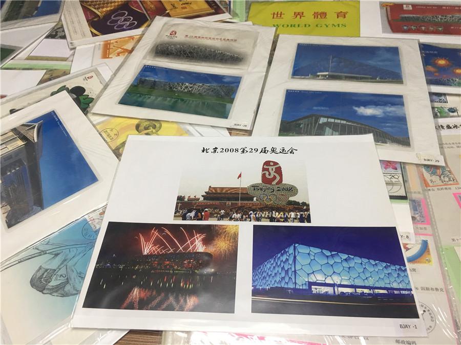 Part of Kong Xiangming\'s postcard collection, featuring the Beijing 2008 Olympic Games. (Photo/chinadaily.com.cn)