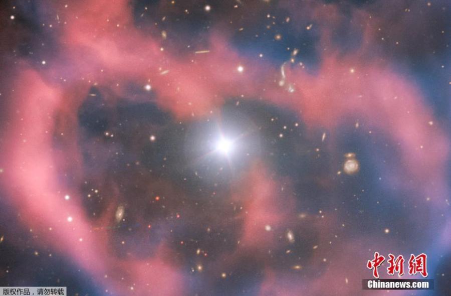 The European Southern Observatory (ESO) has released a beautiful photo taken by its Very Large Telescope (VLT) of a planetary nebula called ESO 577-24,which resides approximately 1,400 light-years away from Earth. The FORS2 instrument captured the bright, central star, Abell 36, as well as the surrounding planetary nebula. The red and blue portions of this image correspond to optical emission at red and blue wavelengths, respectively. An object much closer to home is also visible in this image — an asteroid wandering across the field of view has left a faint track below and to the left of the central star. And in the far distance behind the nebula a glittering host of background galaxies can be seen. (Photo/Agencies)