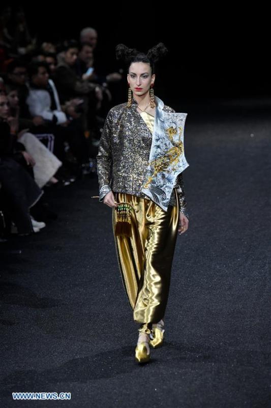 A model presents a creation of Guo Pei during the Haute Couture 2019 Spring/Summer collection shows in Paris, France, on Jan. 23, 2019. (Xinhua/Piero Biasion)