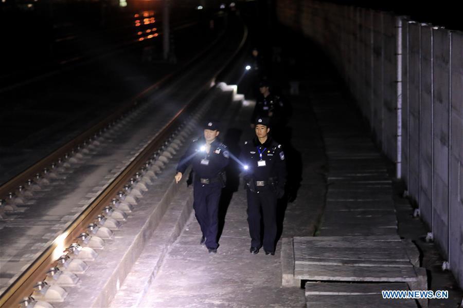 Police officers patrol on Guiyang-Guangzhou High-speed Railway, Jan. 22, 2019. Rongjiang Railway Police Station conducts two or three safety inspections at night every week during the Spring Festival travel rush. (Xinhua/Ou Dongqu)