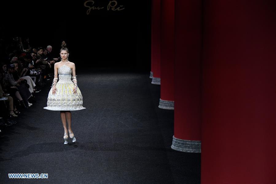 A model presents a creation of Guo Pei during the Haute Couture 2019 Spring/Summer collection shows in Paris, France, on Jan. 23, 2019. (Xinhua/Piero Biasion)
