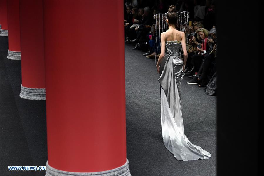 A model presents a creation of Guo Pei during the Haute Couture 2019 Spring/Summer collection shows in Paris, France, on Jan. 23, 2019. (Xinhua/Piero Biasion)