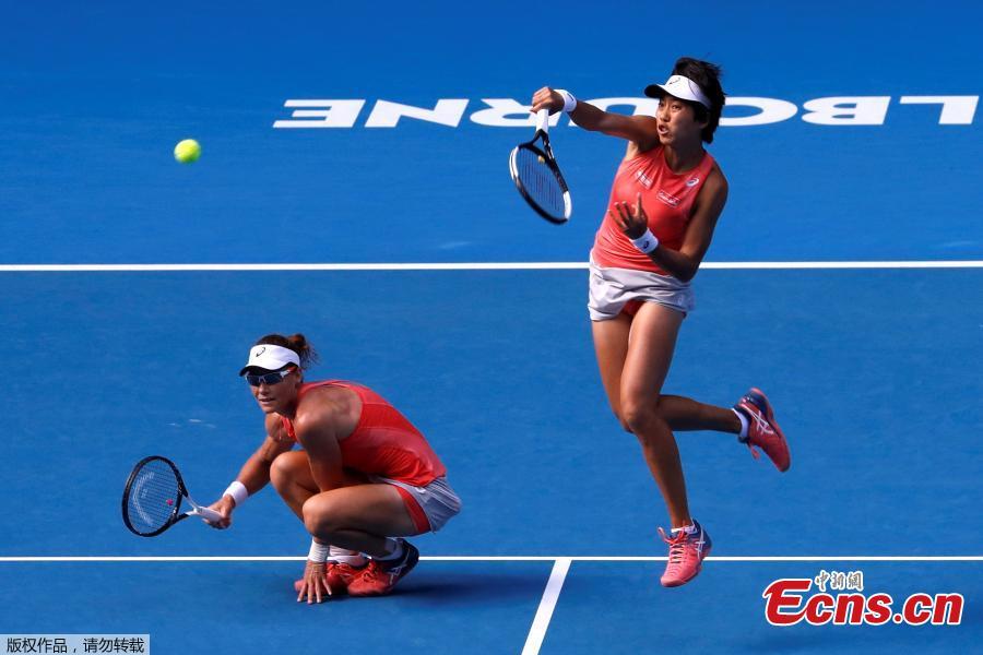 Zhang Shuai of China and Samantha Stosur of Australia compete during the women\'s doubles final match against Timea Babos of Hungary and Kristina Mladenovic of France at 2019 Australian Open in Melbourne, Australia, Jan. 25, 2019. (Photo/Agencies)
