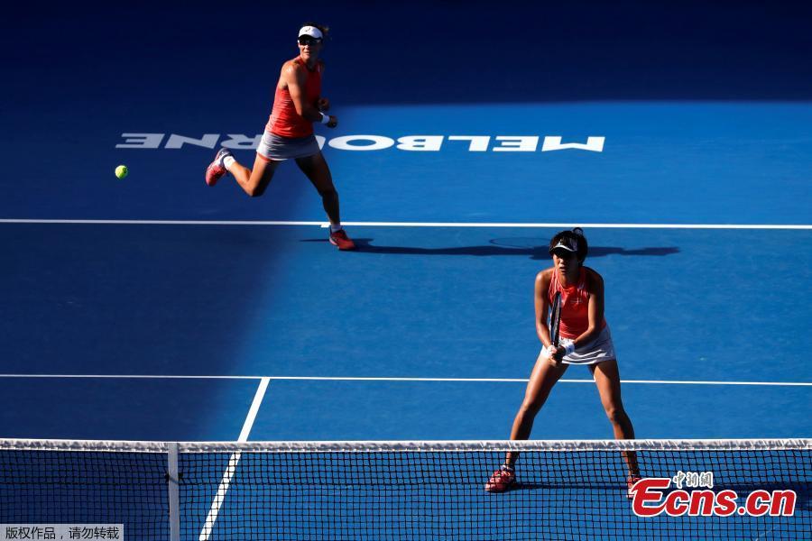 Zhang Shuai of China and Samantha Stosur of Australia compete during the women\'s doubles final match against Timea Babos of Hungary and Kristina Mladenovic of France at 2019 Australian Open in Melbourne, Australia, Jan. 25, 2019. (Photo/Agencies)