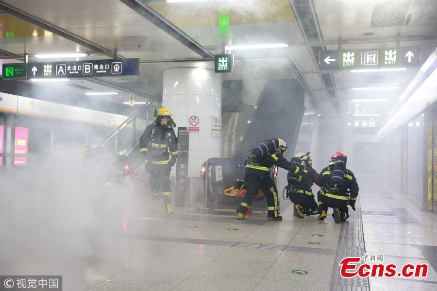 A firefighting drill is held at Beijing West Railway Station on Jan 24, 2019. The fire brigade held the emergency drill to beef up security for the Spring Festival travel rush. (Photo/VCG)