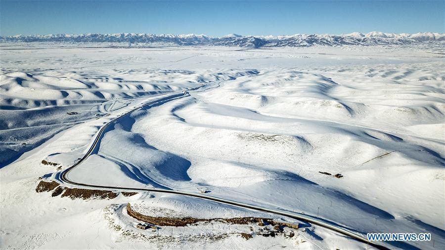 Aerial photo taken on Jan. 18, 2019 shows the snow cover in Zhaosu County, northwest China\'s Xinjiang Uygur Autonomous Region. A nine-member research team with an average age under 30 from the Xinjiang Institute of Ecology and Geography under the Chinese Academy of Sciences started a research on snow cover on the Tianshan Mountains in Xinjiang. Snow cover on the Tianshan Mountains is an important source of water resources. Snowmelt provides an abundant water supply for river flow in this area and also affects the ecological system of agricultural and animal husbandry production in the downstream oasis. (Xinhua/Hu Huhu)